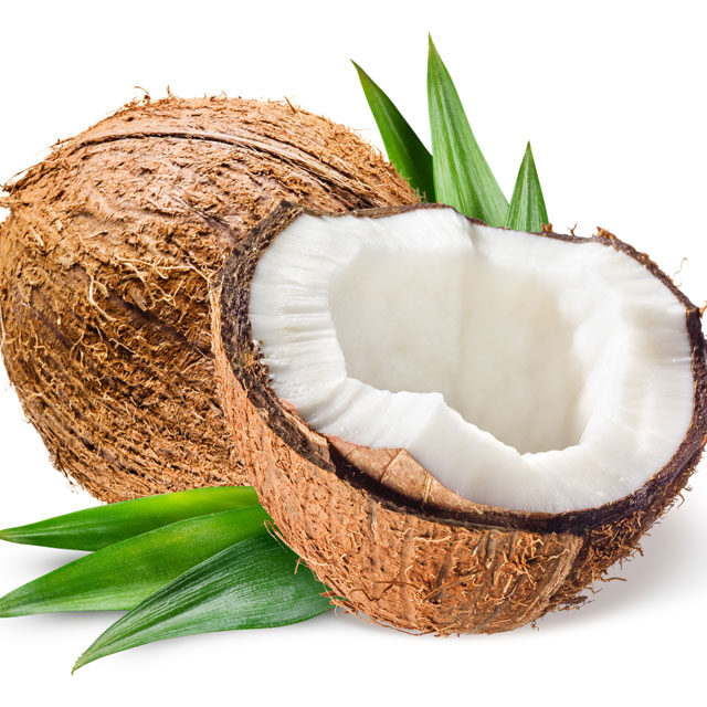 Coconut-with-half-and-leaves-on-white-background